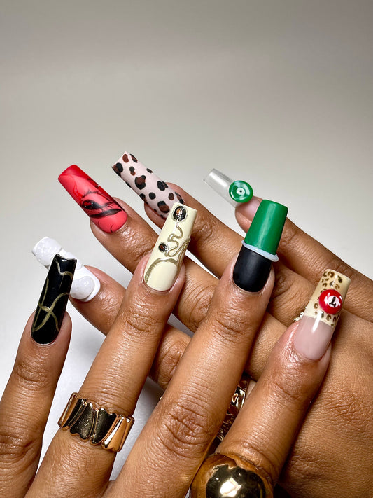 Set of colorful nail art designs on a white background