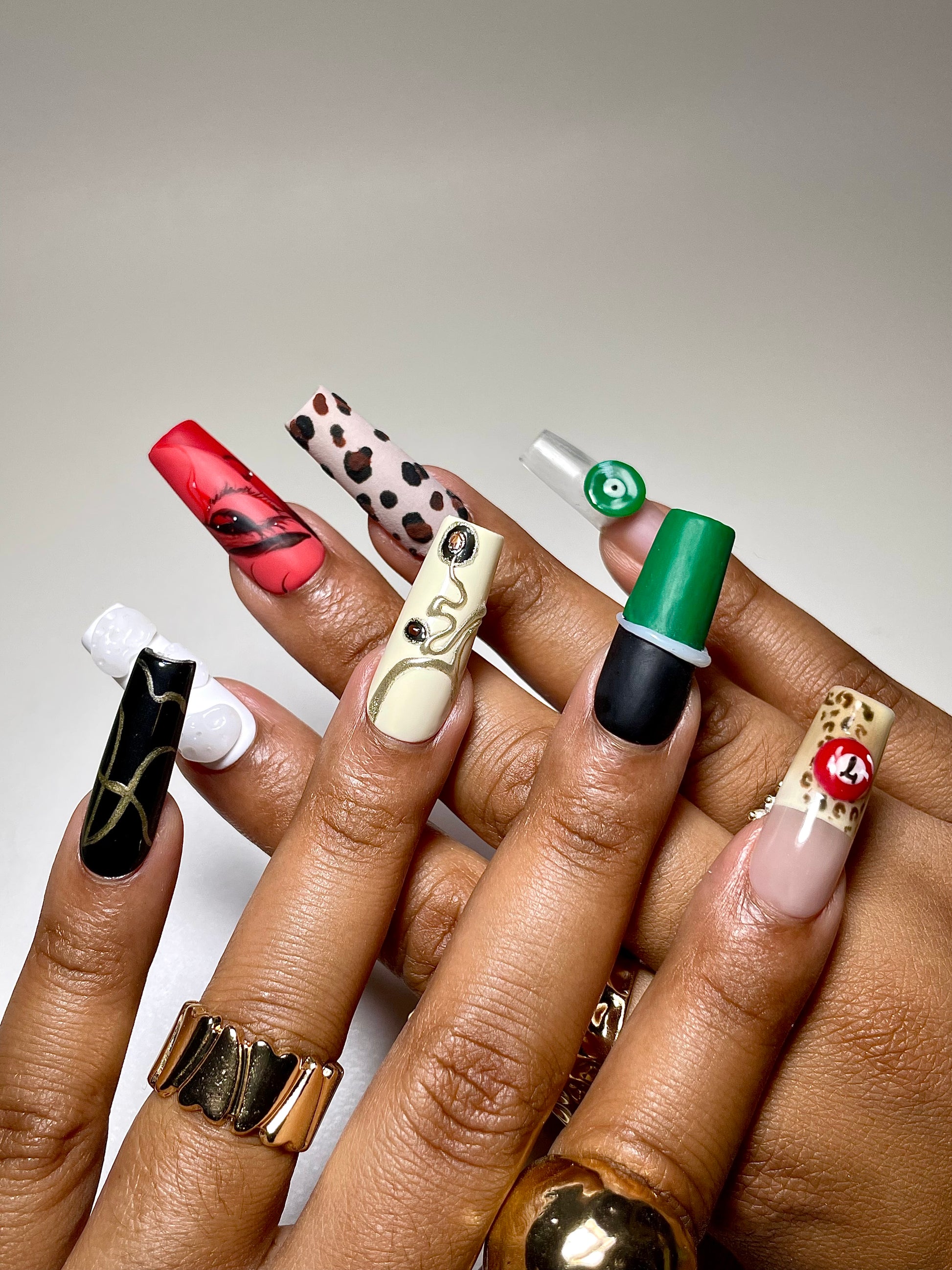 Set of colorful nail art designs on a white background